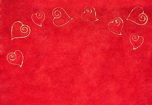 Curlicue hearts on a red background