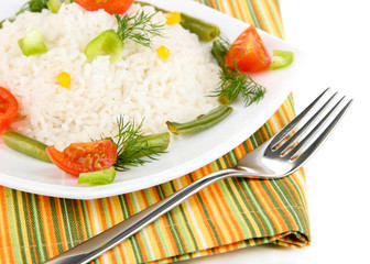Delicious risotto with vegetables isolated on white