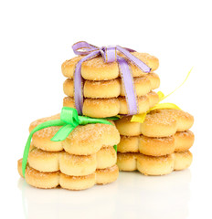 Sweet cookies tied with colorful ribbons isolated on white