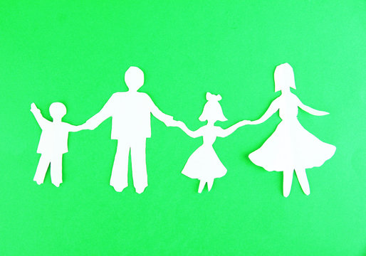 Paper people on color background