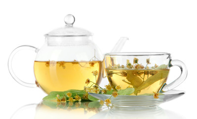 Kettle and cup of tea with linden