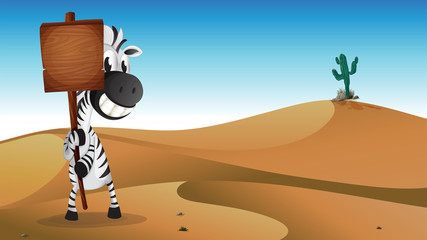 A zebra holding the empty signboard at the desert