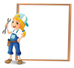 A girl holding a tool beside a big frame