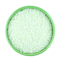 Jasmine rice in green bowl isolated on white background