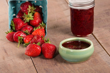 Fresh strawberries and homemade preserves