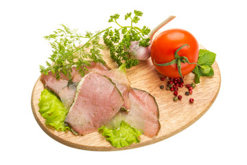 Ripe fresh ham with vegetables