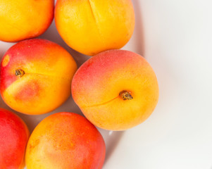 Apricot fruit over white background
