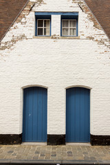 Two blue wooden door - Brugge, Belgium.