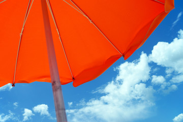 Parasol and beautiful sky with clouds