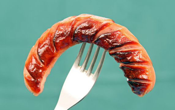 Grilled Sausage On A Fork.