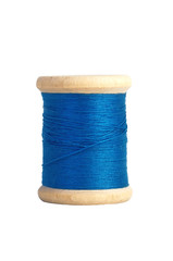 blue thread bobbin isolated on white