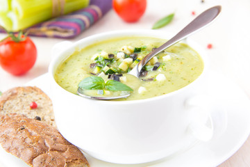 Vegetable green healthy cream soup with avocado, celery, zucchin