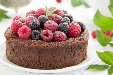 Chocolate mousse cake with raspberries.
