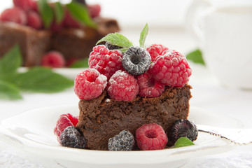 Chocolate mousse cake with raspberries.