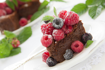 Chocolate mousse cake with raspberries.