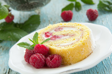 Roulade with raspberries and cream.