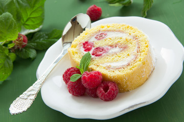 Roulade with raspberries and cream.