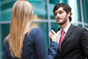 Business partners discussing outdoor