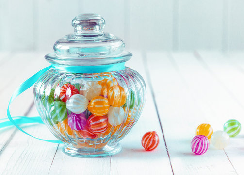 Colourful candy in a decorative jar