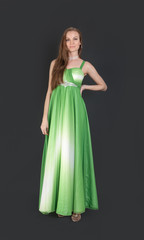 Obraz na płótnie Canvas girl in evening green dress