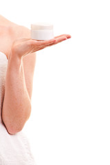Woman hand holding facial cream