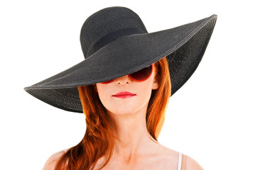 Portrait of attractive elegant woman in black hat