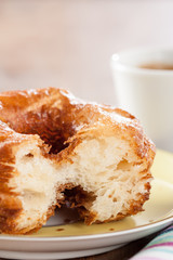 Croissant and doughnut mixture on a dish close-up