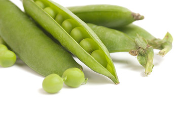 fresh green peas isolated on a white background