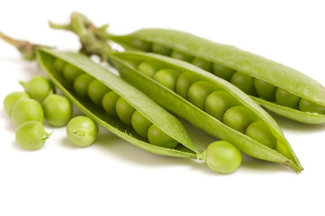 fresh green peas isolated on a white background
