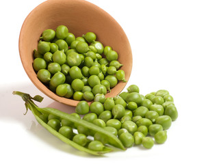 Fresh green peas isolated on a white background