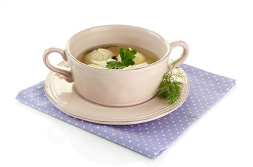 Tasty khinkali in .saucepan, isolated on white