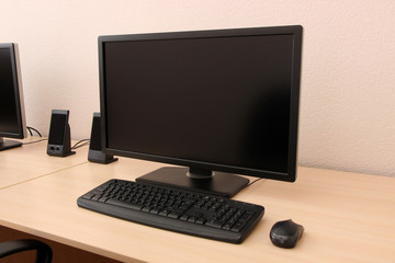 Computer on table in room