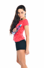 Fototapeta premium Young fitness woman with a bottle of water