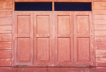 Obraz premium Red wooden window