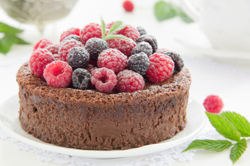 Chocolate mousse cake with raspberries.