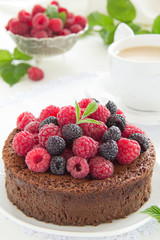 Chocolate mousse cake with raspberries.