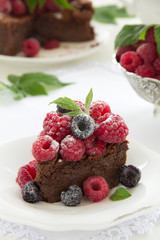 Chocolate mousse cake with raspberries.