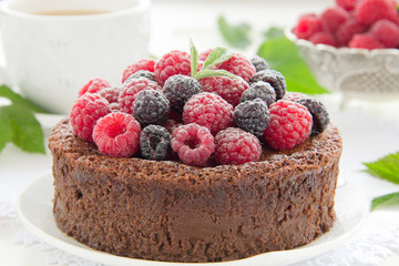 Chocolate mousse cake with raspberries.