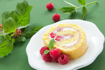 Roulade with raspberries and cream.
