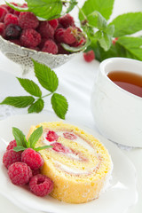 Roulade with raspberries and cream.