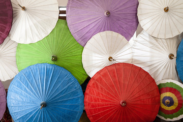 Colorful umbrellas with wooden handle, Chiang Mai, Thailand.