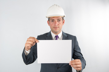 he is holding a notepad