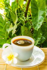coffee cup on bamboo wrap