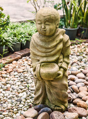 Fototapeta na wymiar Funny traditional Thai garden sculpture
