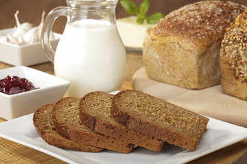 Breakfast with wholemeal bread and jam and milk