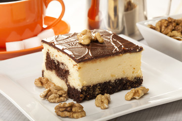 Cheesecak with a cap of coffee 