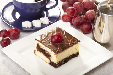 Cheesecak with a cap of coffee 