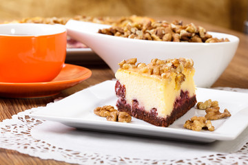 Cheesecak with a cap of coffee or tea 