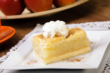 Delicious apple pie with whipped cream