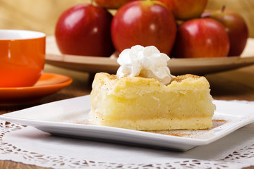 Delicious apple pie with whipped cream,